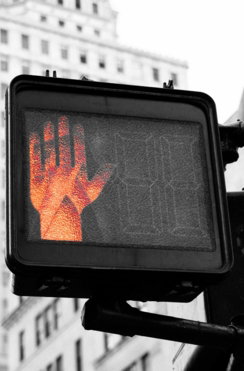 closeup photo of street go and stop signage displaying stop